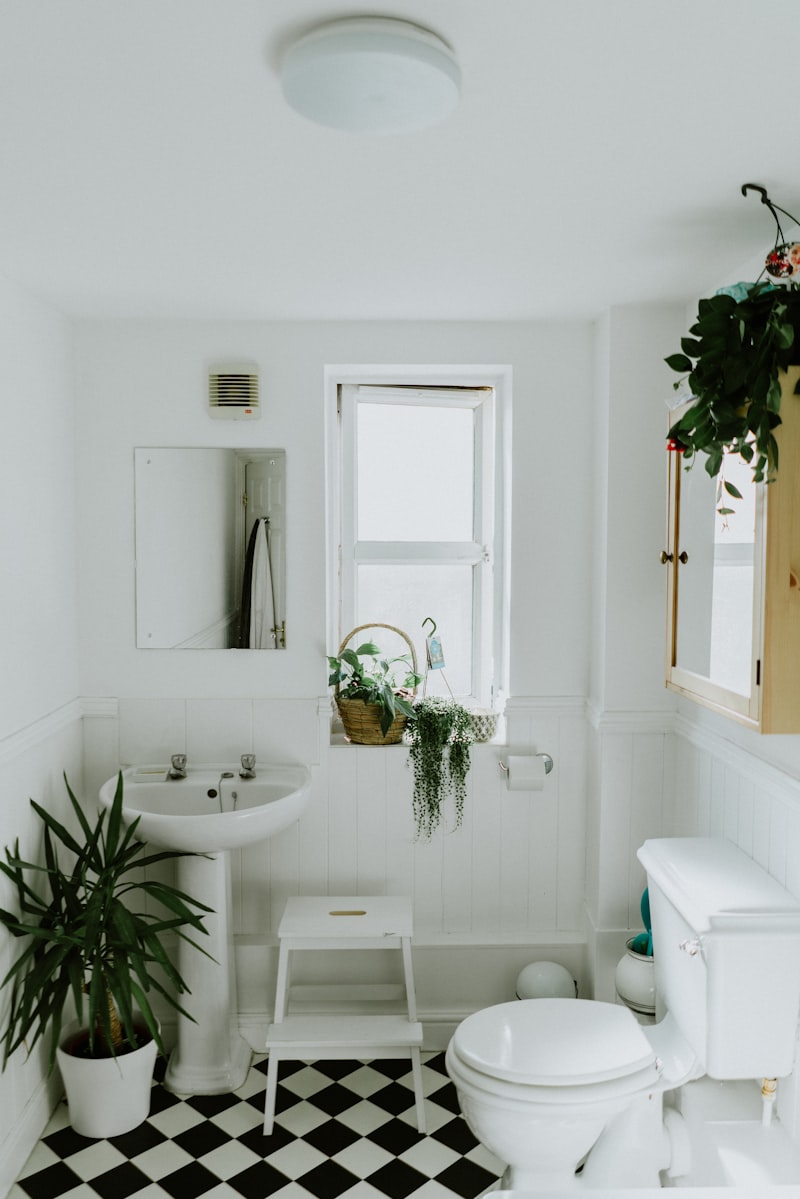 Bathroom before renovation — old fixtures and dated tile